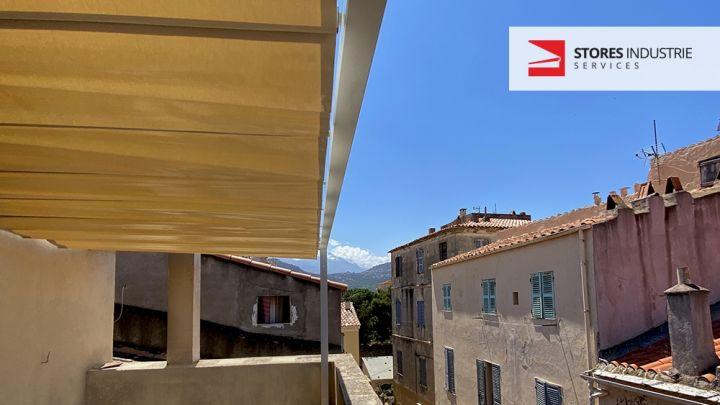 pergola retractable manuel abris balcon vue mer ile rousse